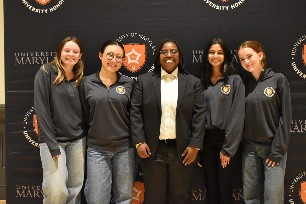 UH Student Board members stand with UH Alumni Jasmine Crooks
